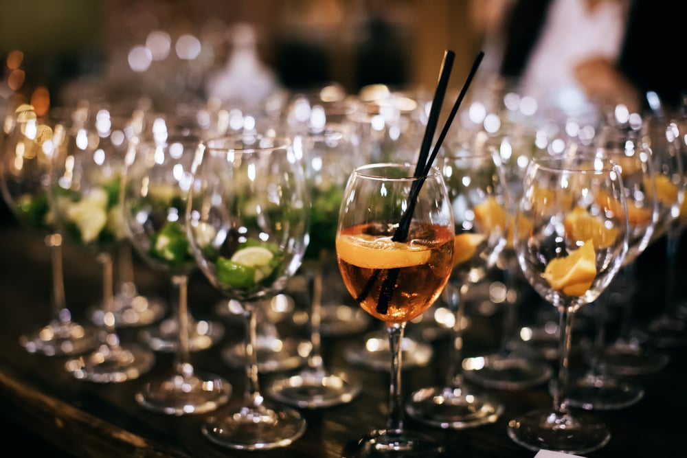 Glasses with alcoholic cocktails on a cocktail reception at a party at a restaurant